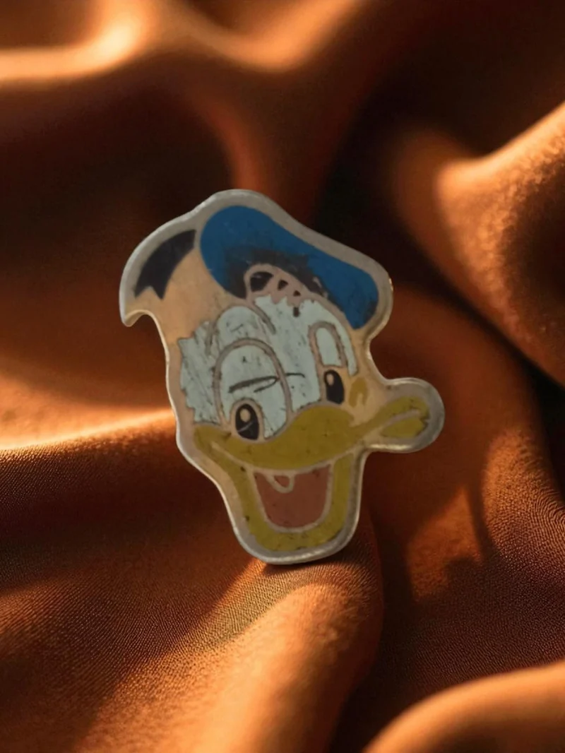 Pin's ancien Donald Disney vintage badge rétro publicitaire broche