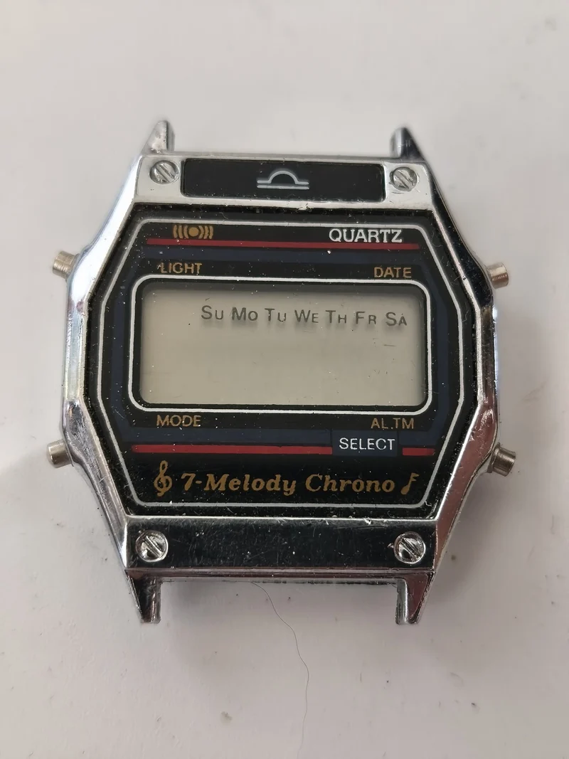 Montre rétro Melody LCD chrono ancien modèle digital à tester collection vintage