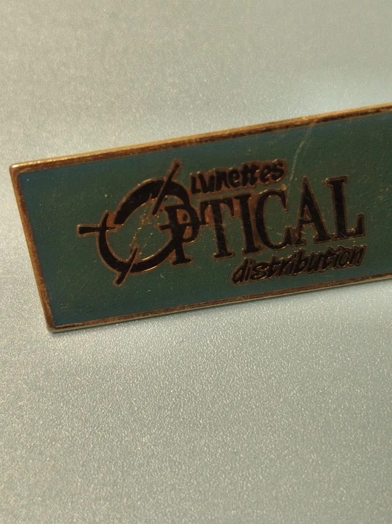 Vintage pin's Lunettes Optical distribution, rectangulaire, bleu vert, collectio