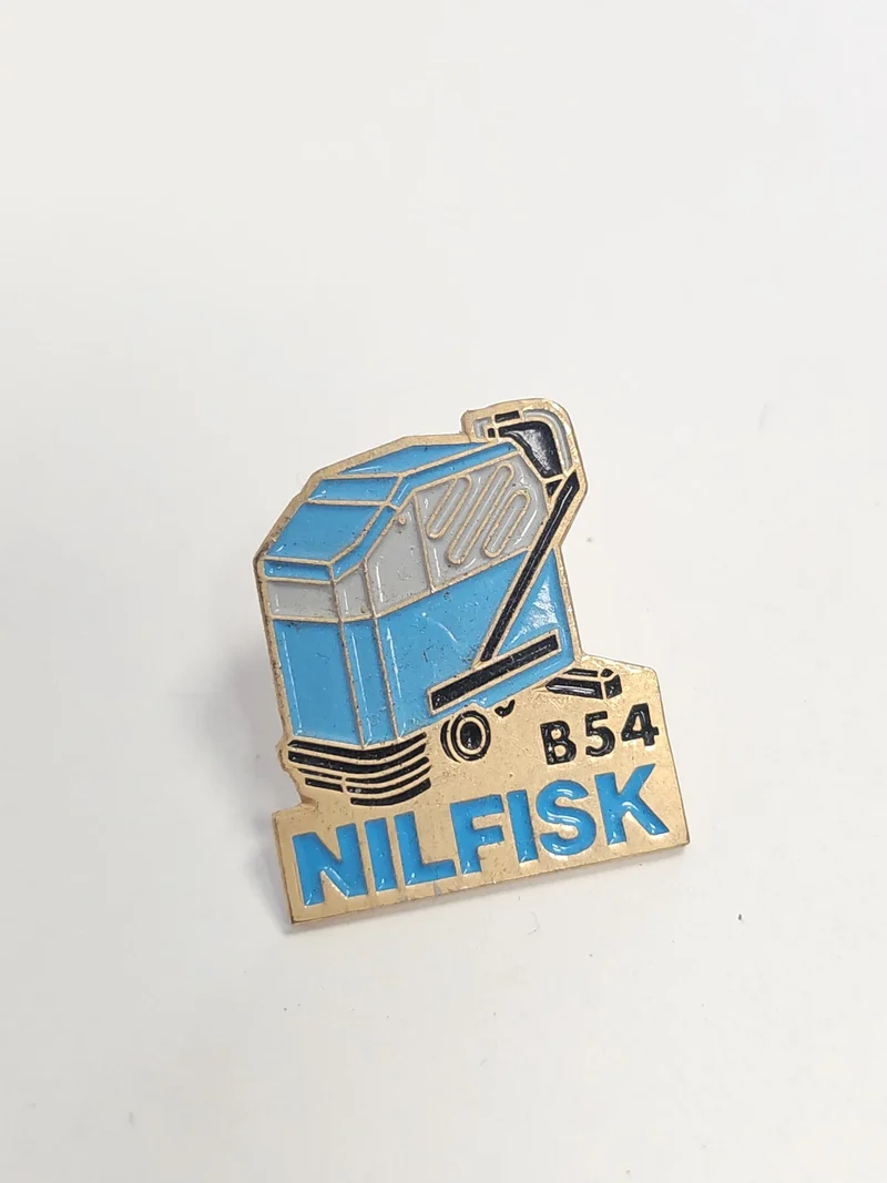 Pin's rétro Nilfisk ancien badge publicitaire collection vintage rare occasion
