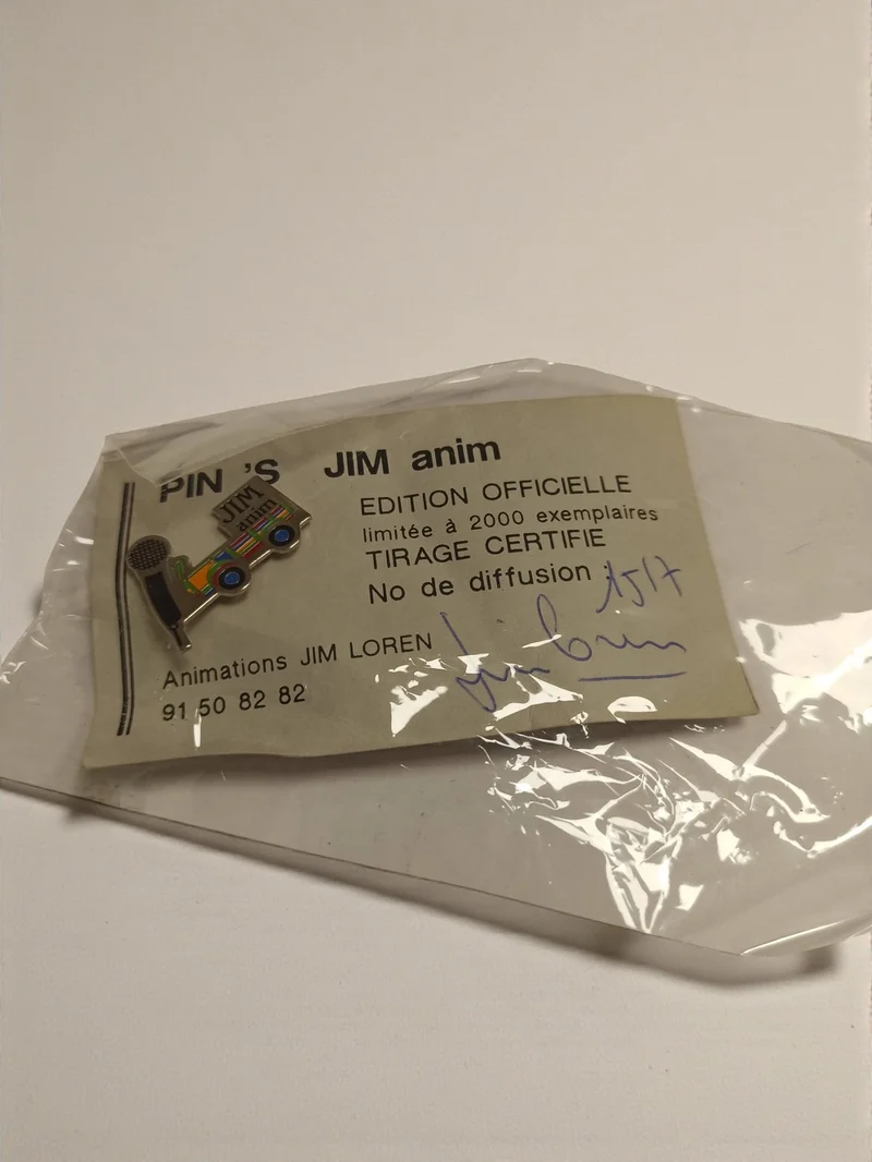 Pin's JIM anim édition limitée 2000 ex, badge vintage camion coloré, certifié