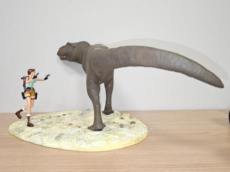 Figurine Tomb Raider Lara Croft avec T-Rex Diorama Atlas Jeu Vidéo Héros