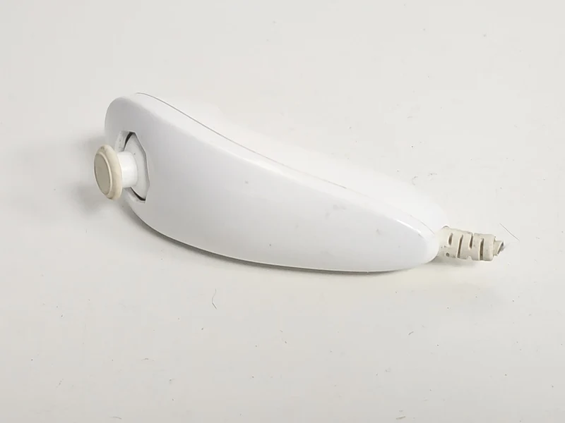 Manette Nunchuck Nintendo Wii défectueuse pour pièces détachées accessoire origi