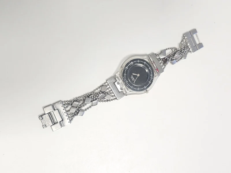 Montre femme Swatch Brim Over ancienne, rétro, vintage, fonctionnelle, collectio
