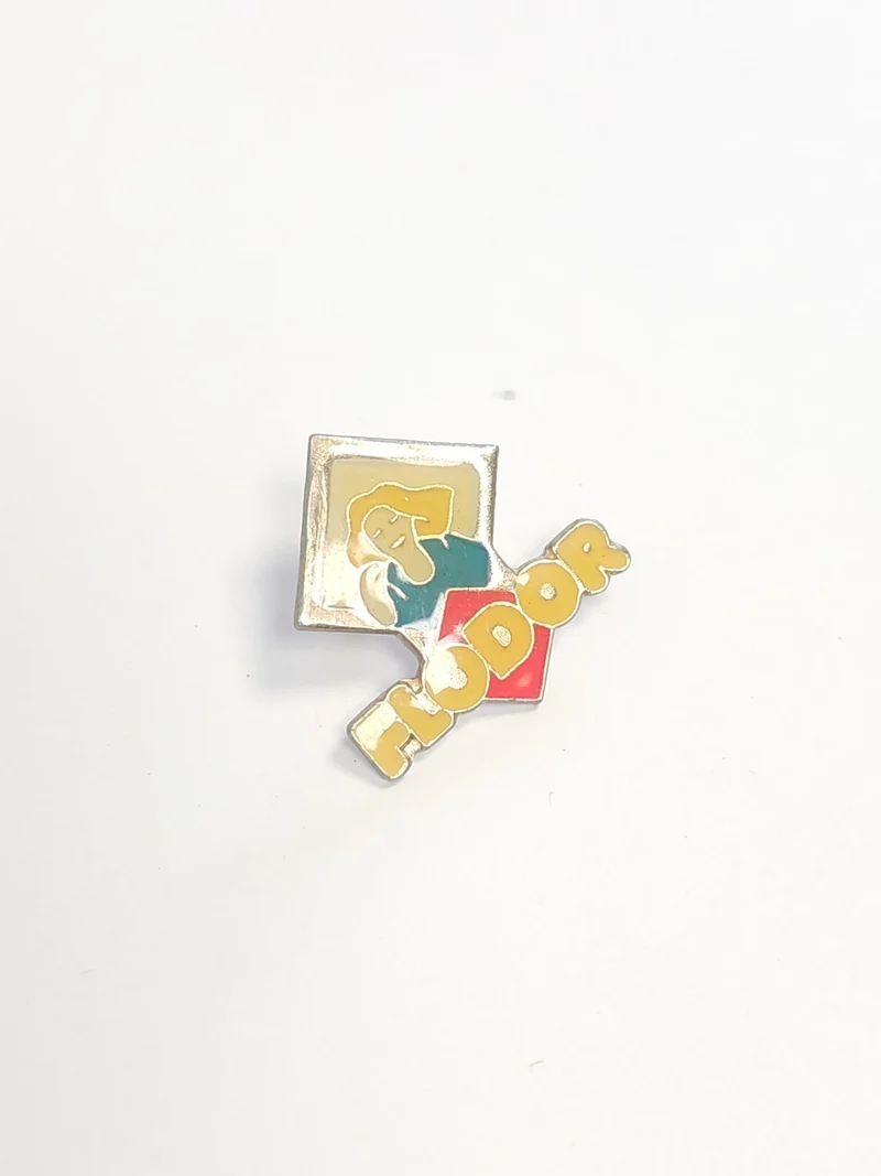 Pin's rétro Flodor ancien, badge publicitaire vintage collection France années 8