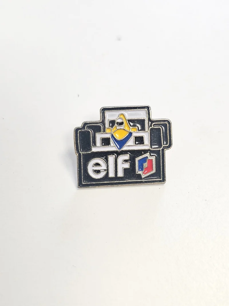 Pin's ancien ELF vintage, badge rétro collection automobile, objet publicitaire