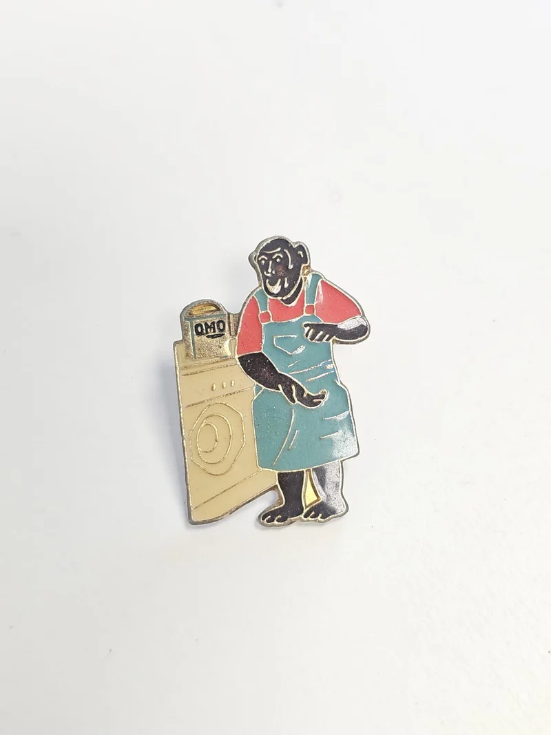 Pin's rétro Omo ancien, badge publicitaire vintage collection années 80 90