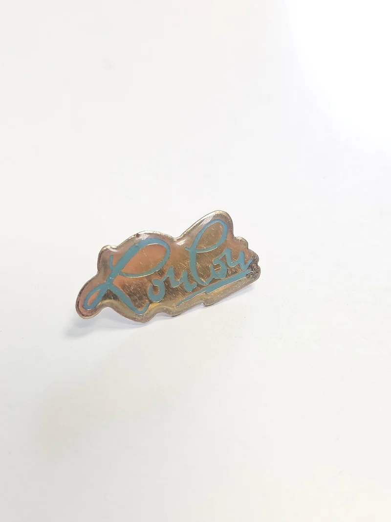 Pin's ancien Cacharel vintage rétro, badge de collection mode années 80 90 rare