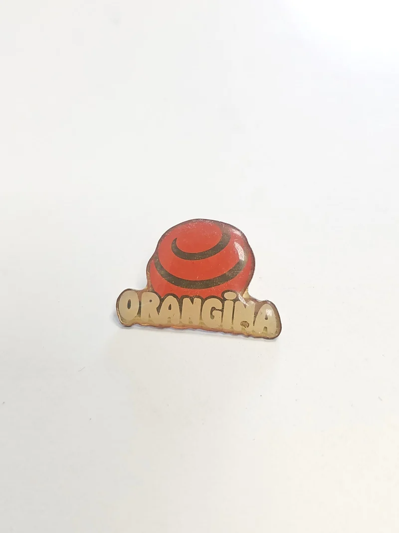 Pin's rétro Orangina ancien ? Badge publicitaire collection boisson vintage Fran