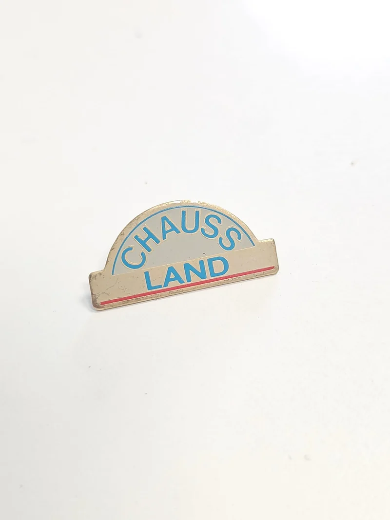 Pin's rétro ancien Chauss Land publicitaire vintage collection badge rare France