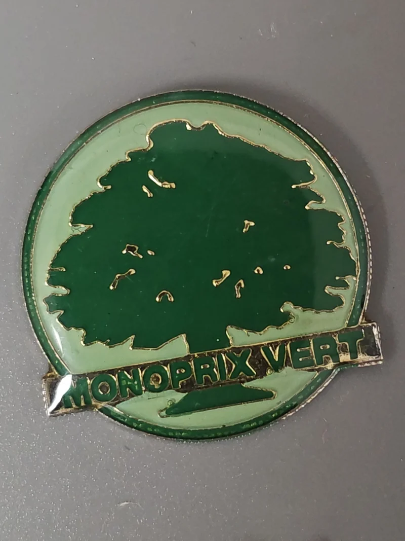 Pin's ancien Monoprix vintage rétro collection badge publicitaire France